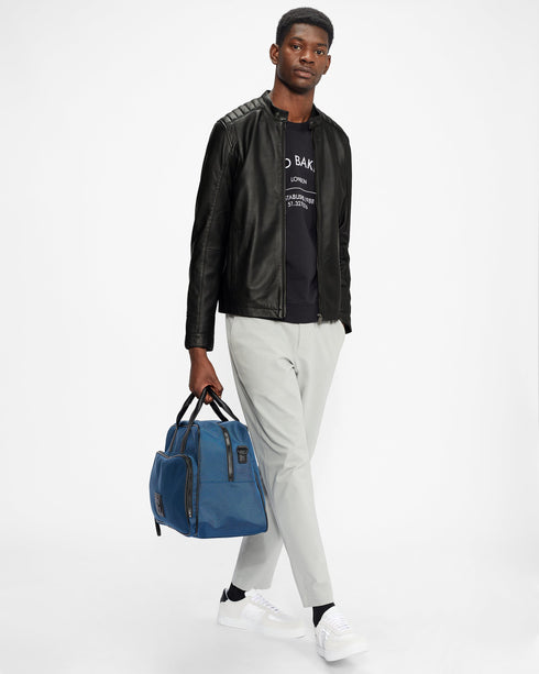 PAYPA-Outerwear-Perfect for weekends or evenings out, the PAYPA jacket is sure to become a permanent fixture in any gent's wardrobe. Crafted in luxurious leather and fully lined with branded Ts, the button collar on the neck lends a unique finish to the style. Leather Zip fastening Internal pocket Quilted detail on shoulders Fully lined Side pockets Button detail on neck and sleeve Our model is 6'2" 1.87m and wears a Ted size 3- Ted Baker Romania